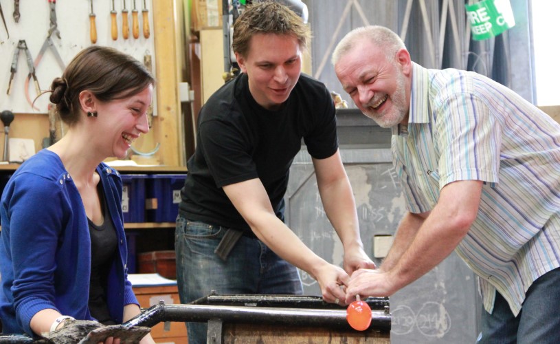 Person in glass making workshop